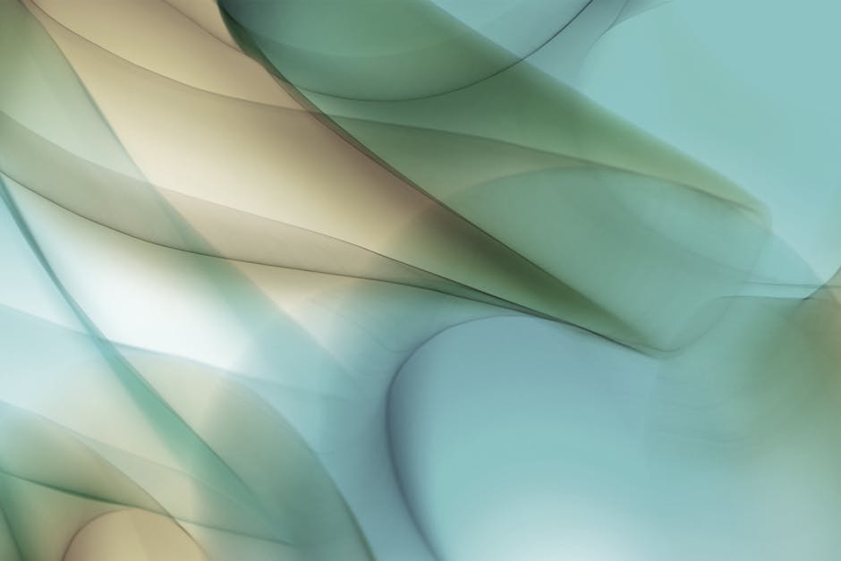 Abstract digital landscape with flowing shapes in blue and green hues.