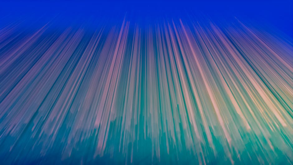 Abstract shapes and colors representing speed and motion in a digital landscape.