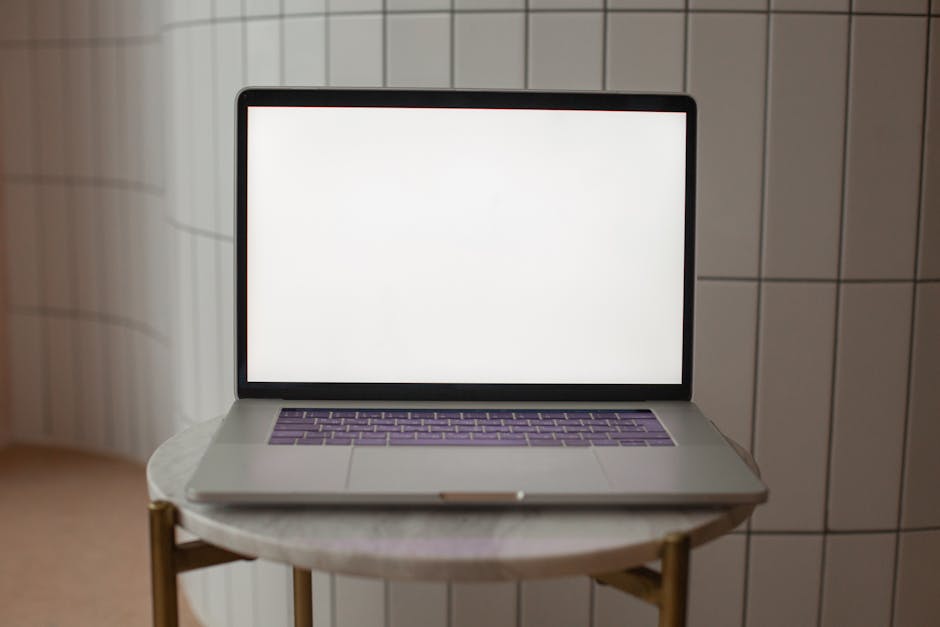 Designer workspace with blank logo assets and measurement tools