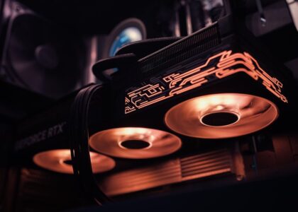 A modern ASIC miner setup with glowing lights and circuit boards.