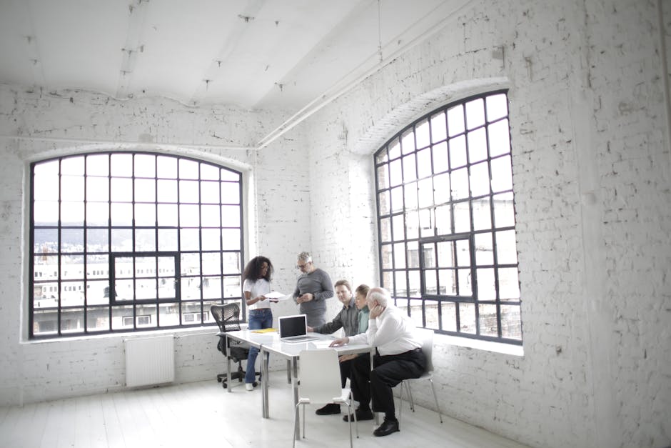 A collaborative office scene with a diverse team working together