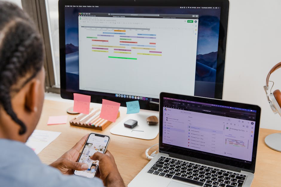 Modern workspace with abstract dashboard screens and connected workflow elements