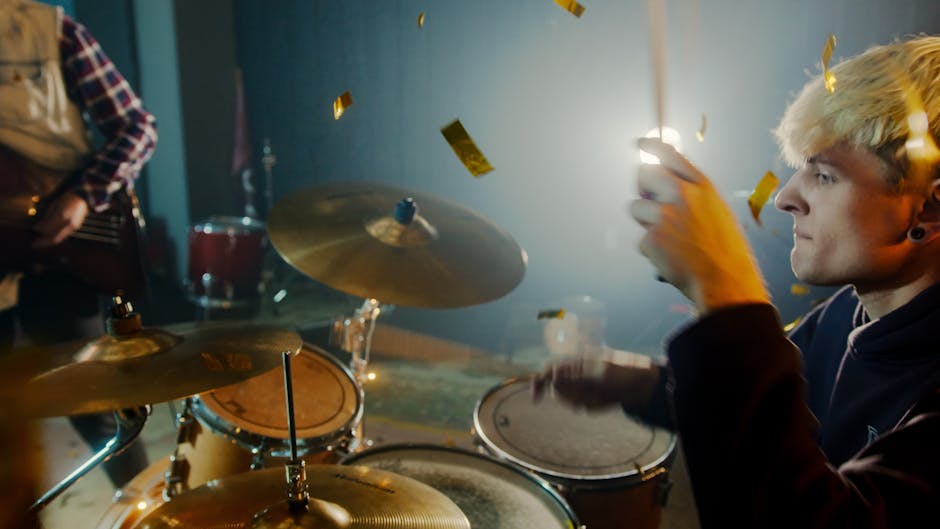 A lively stage with colorful lights and musical instruments ready for performance.