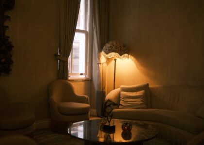 A modern office interior with elegant furniture and soft lighting.