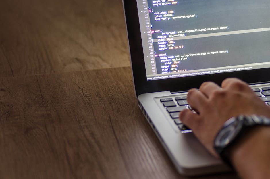 Developer workspace with laptop, game icons, and repository-style activity visuals