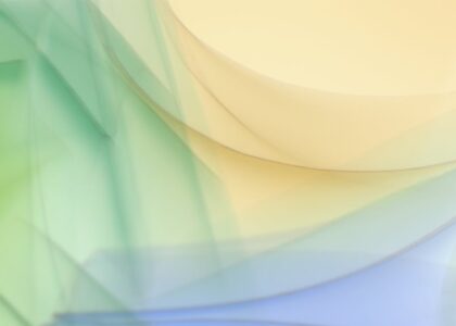 A colorful abstract digital workspace with soft gradients and shapes.