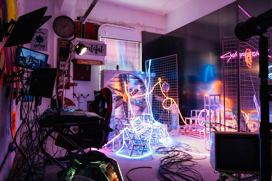 A colorful digital art studio with abstract shapes and art supplies.