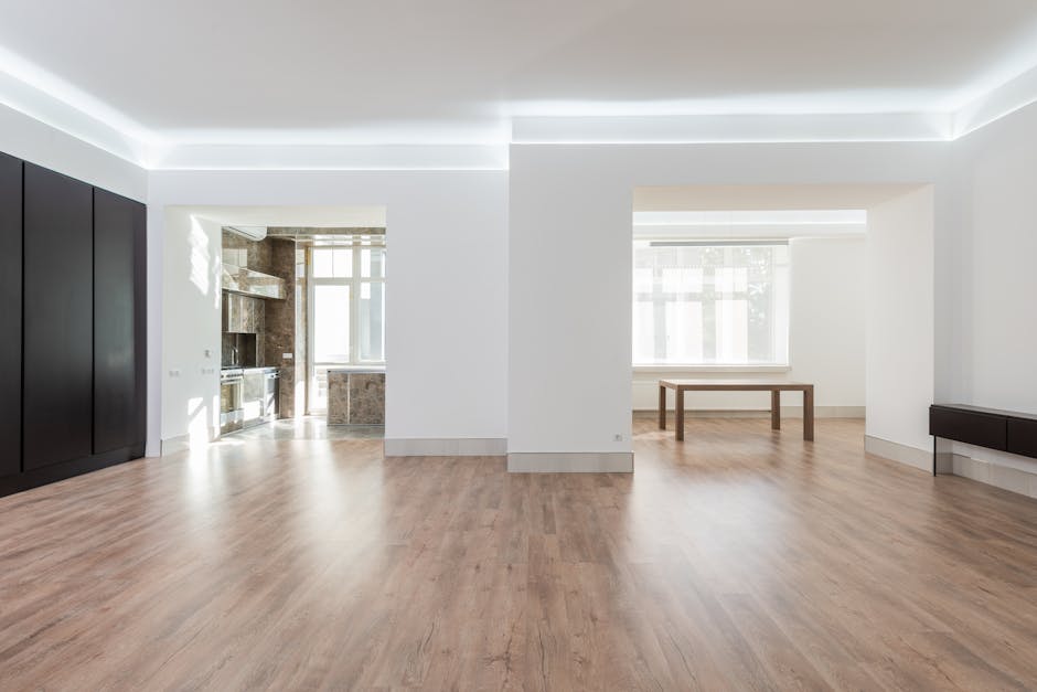 A modern home interior with a digital tablet and abstract shapes.