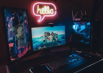 A glowing character-design workspace with avatars, chat icons, and neon panels.