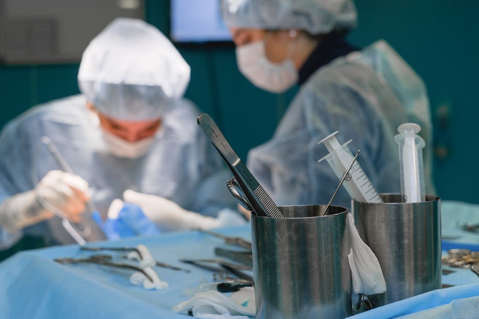 A modern operating room with surgical tools and bright lighting.