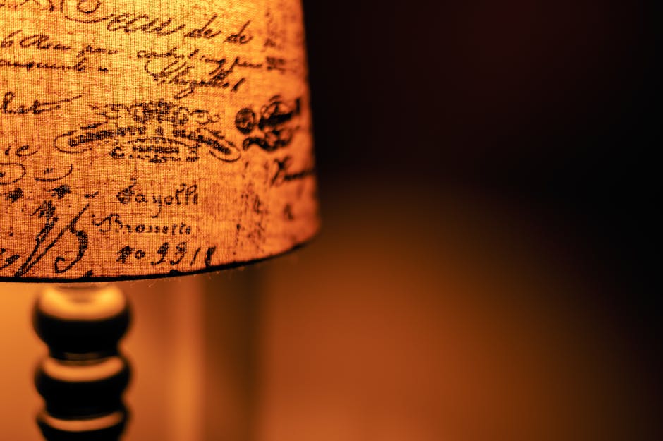 Vintage microphone on a dimly lit stage with warm lights