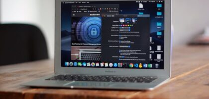Chromebook displaying a blurred online arena game with safety symbols