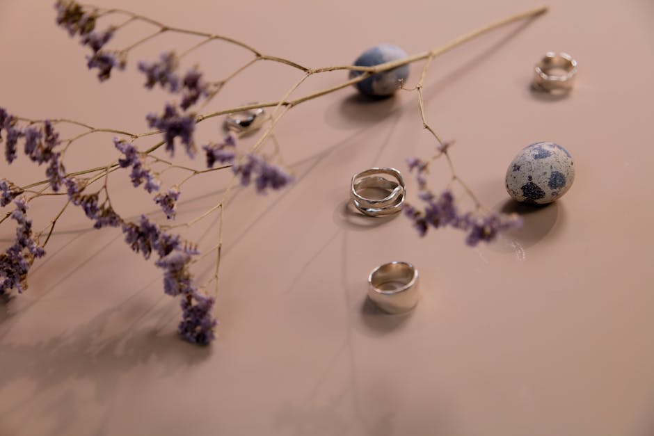 A stylish arrangement of luxury fashion items and art pieces.