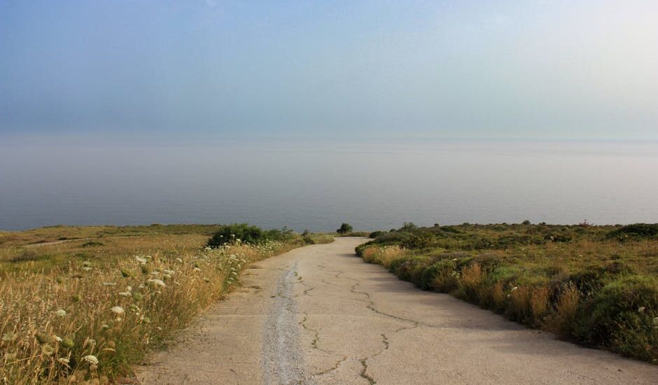 A winding path in a soft pastel landscape representing internet navigation.