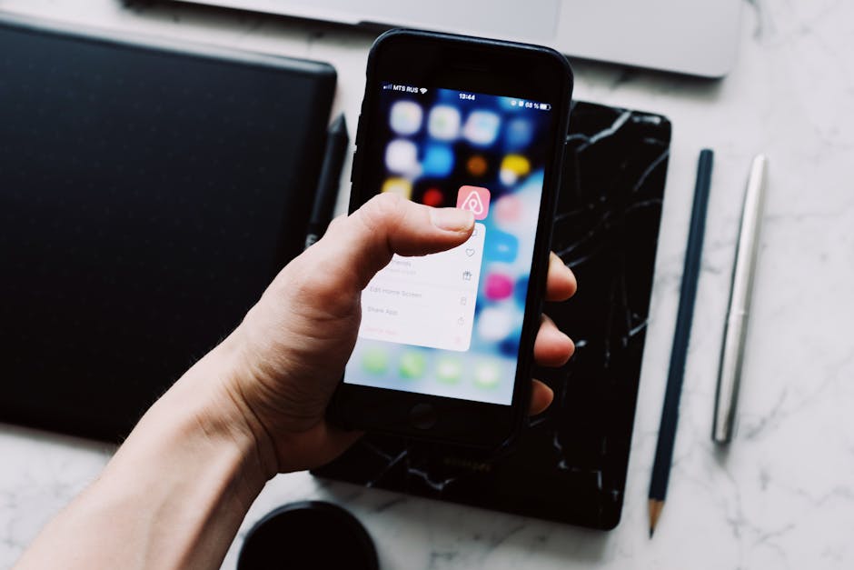 Smartphone with abstract chat bubbles beside minimalist productivity symbols
