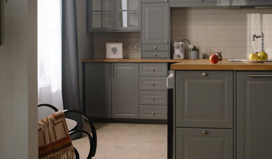A modern kitchen countertop with innovative cleaning tools and soft lighting.